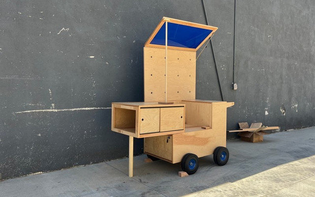 Our new handmade event cart by R/D Record Cabinets with the blue acrylic panel raised, outside their Glassell Park workshop
