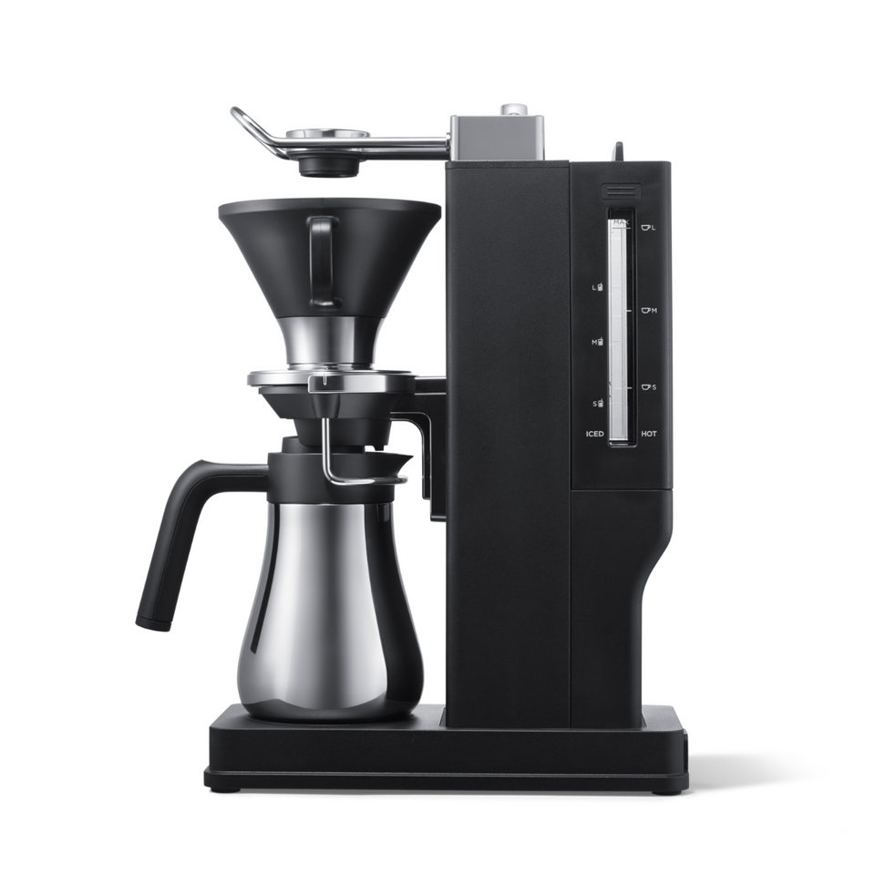 Black and silver coffee brewing device on a white background